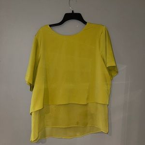 Mustard shirt with an open back